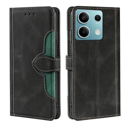Black leather phone case with magnetic strap, green trim, shows light blue phone back