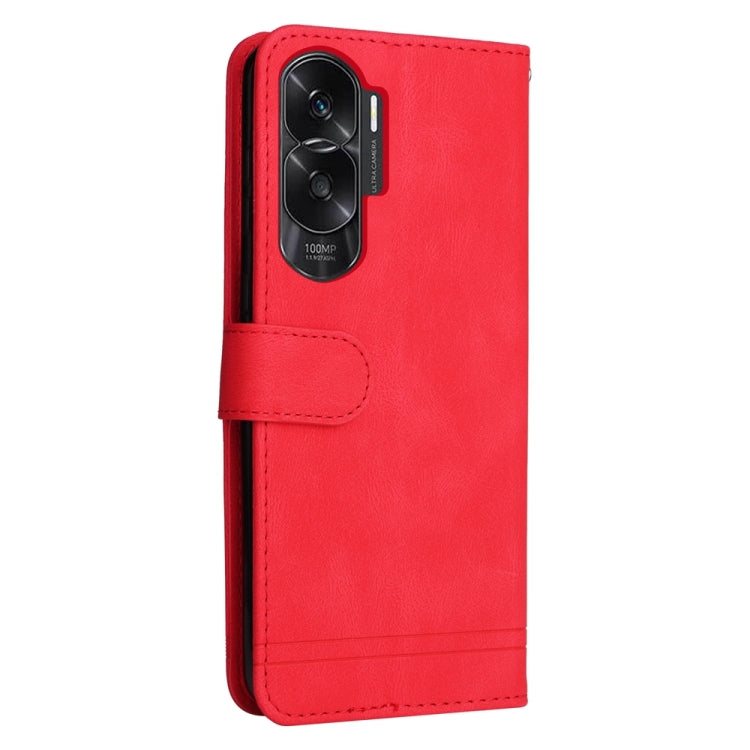 Red leather wallet-style phone case with camera cutout and stitched side flap