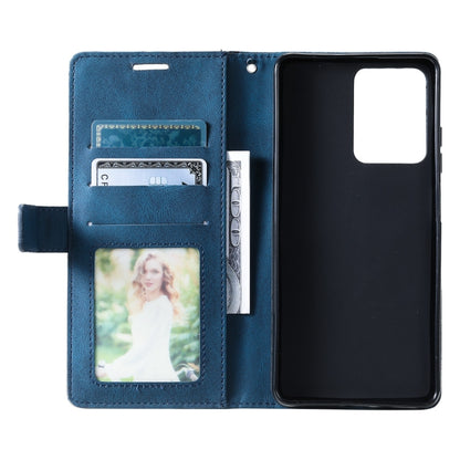 Blue leather folio phone case with inner photo pocket and full front cover