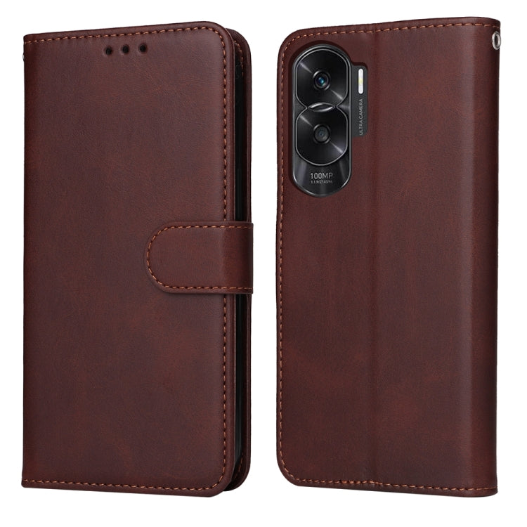Brown calf-texture flip leather phone case with side strap and camera cutout