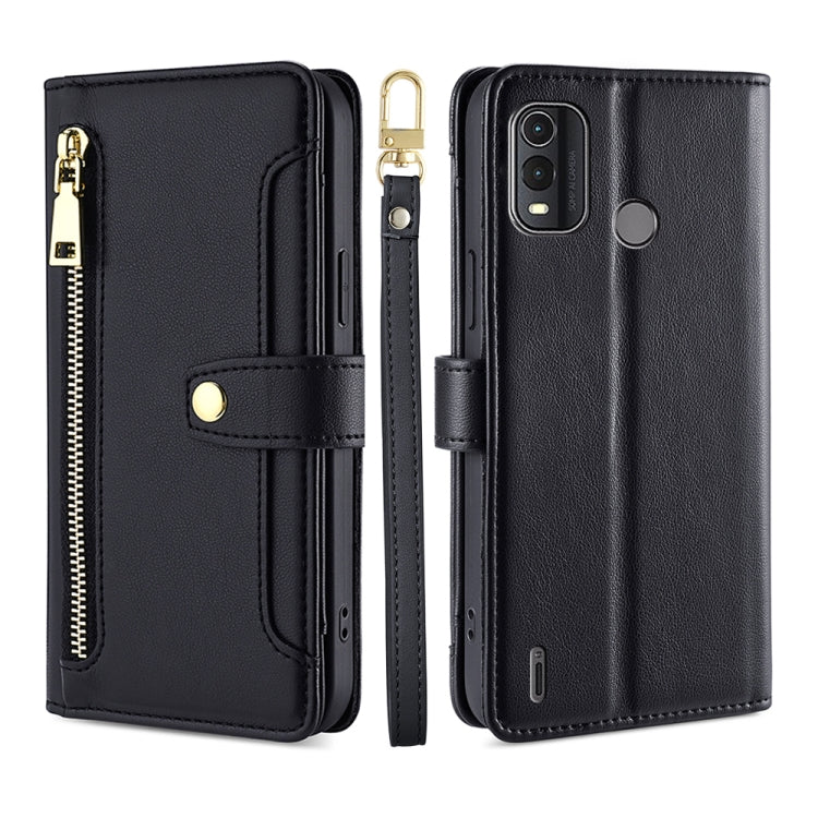 Black leather cross-body zipper wallet phone case with phone cutouts and gold hardware.