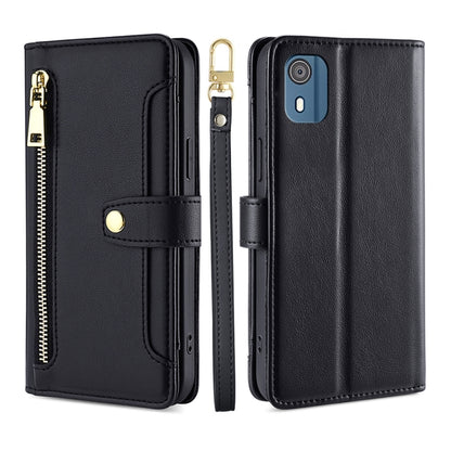Black leather cross-body zipper wallet phone case with gold hardware and front card slot.