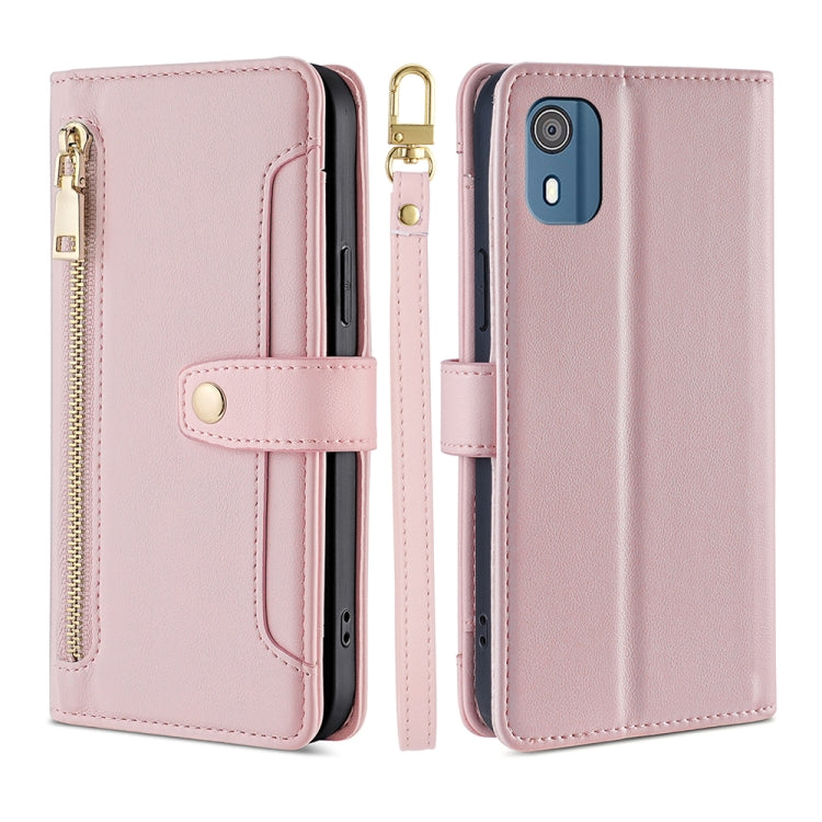 Pink leather cross-body wallet phone case with zipper pocket and flip stand