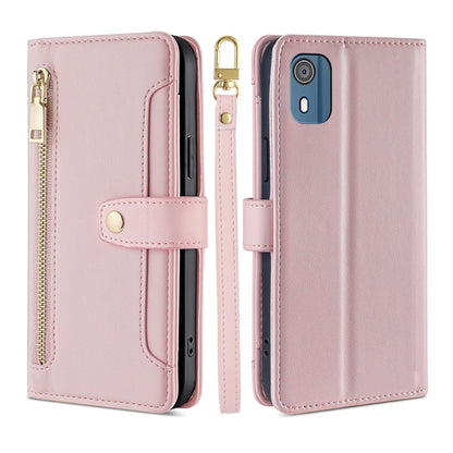 Pink leather cross-body wallet phone case with zipper pocket and flip stand