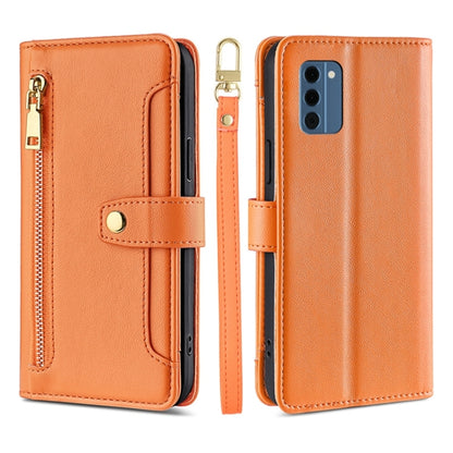 Orange leather cross-body wallet phone case with zipper pocket and flip cover