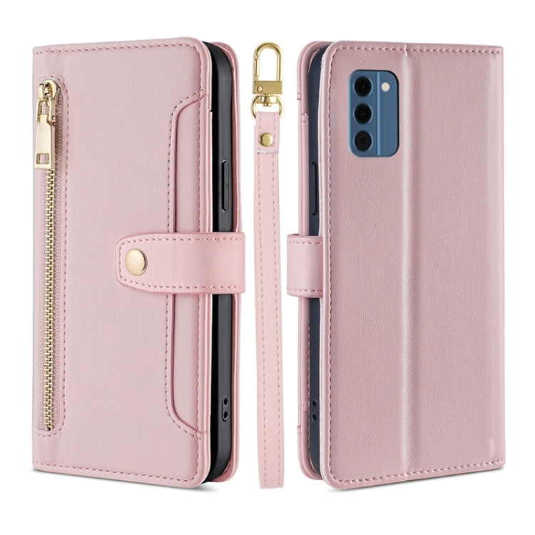Blush pink leather cross-body wallet phone case with zipper pocket and flip cover