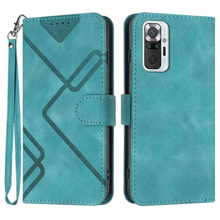 Teal leather folio phone case with geometric pattern, wrist strap, and card-slot flap