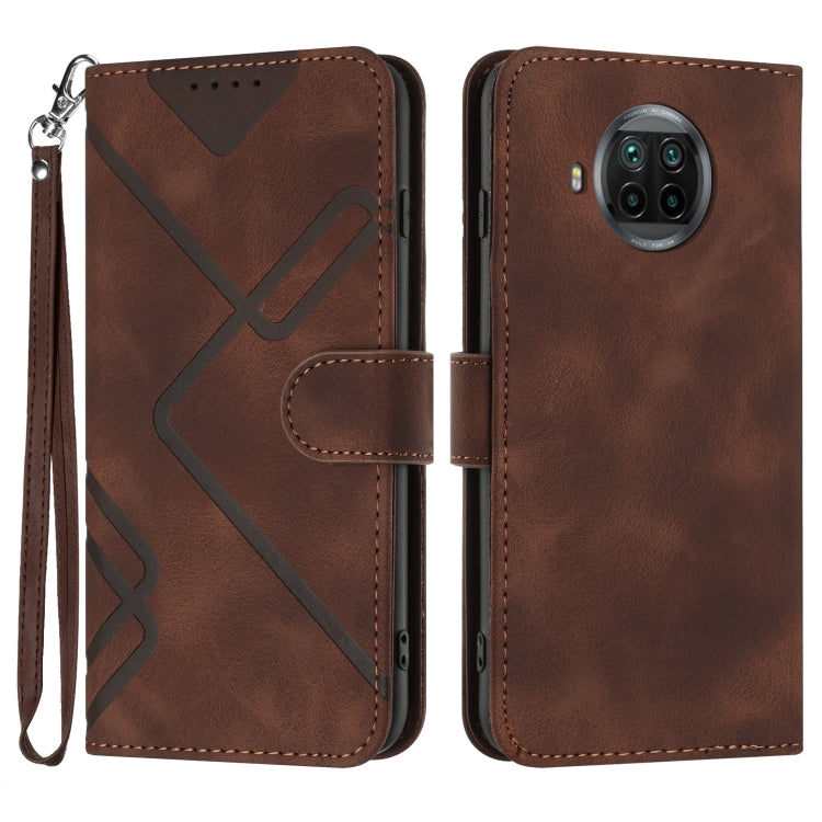 Brown leather wallet phone case with wrist strap, geometric pattern, and card slot flap