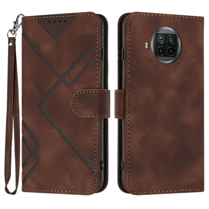 Brown leather wallet phone case with wrist strap, geometric pattern, and card slot flap