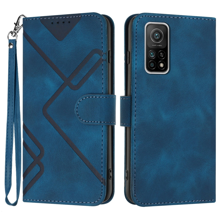 Blue leather wallet phone case with wrist strap, geometric pattern, and camera cutout