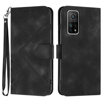 Black leather wallet phone case with wrist strap, geometric pattern, and camera cutout