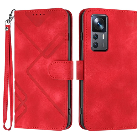 Red leather-look wallet phone case with geometric line pattern and wrist strap