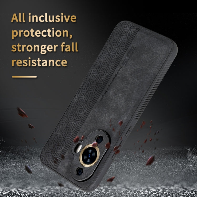 Gray phone case with 3D embossed pattern, raised camera bezel, grippy edge protection.