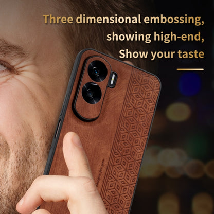 Brown phone case with 3D embossed geometric pattern and dual camera cutouts