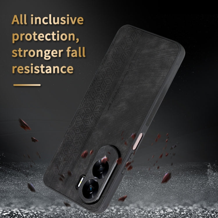 Black phone case with textured geometric embossing and dual camera cutouts