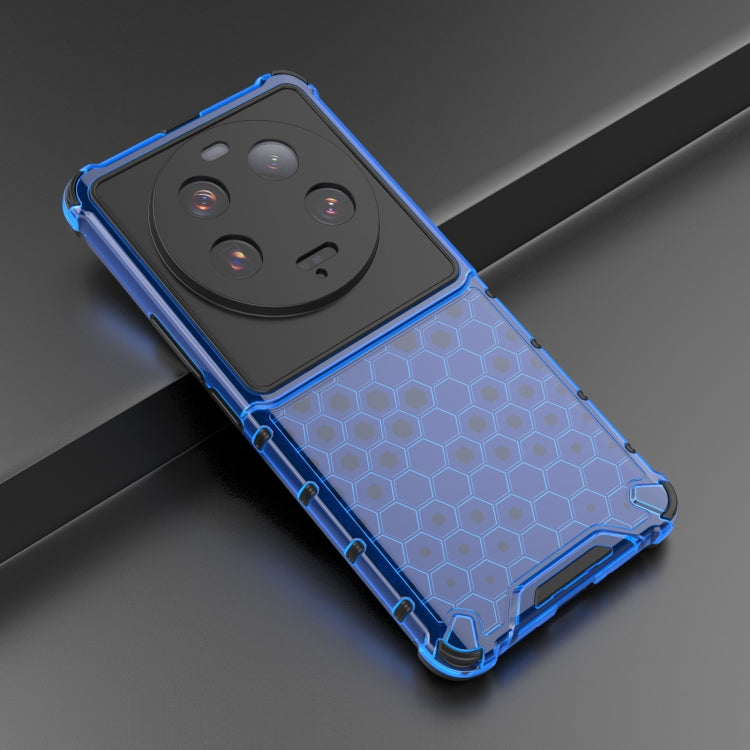 Blue shockproof honeycomb phone case with textured hex pattern and corner protection.