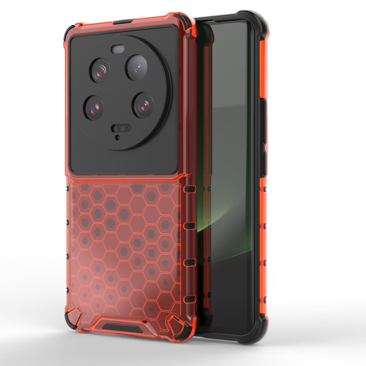 Shockproof honeycomb phone case in orange with raised camera area and grippy edges.