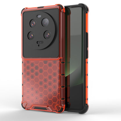 Shockproof honeycomb phone case in orange with raised camera area and grippy edges.