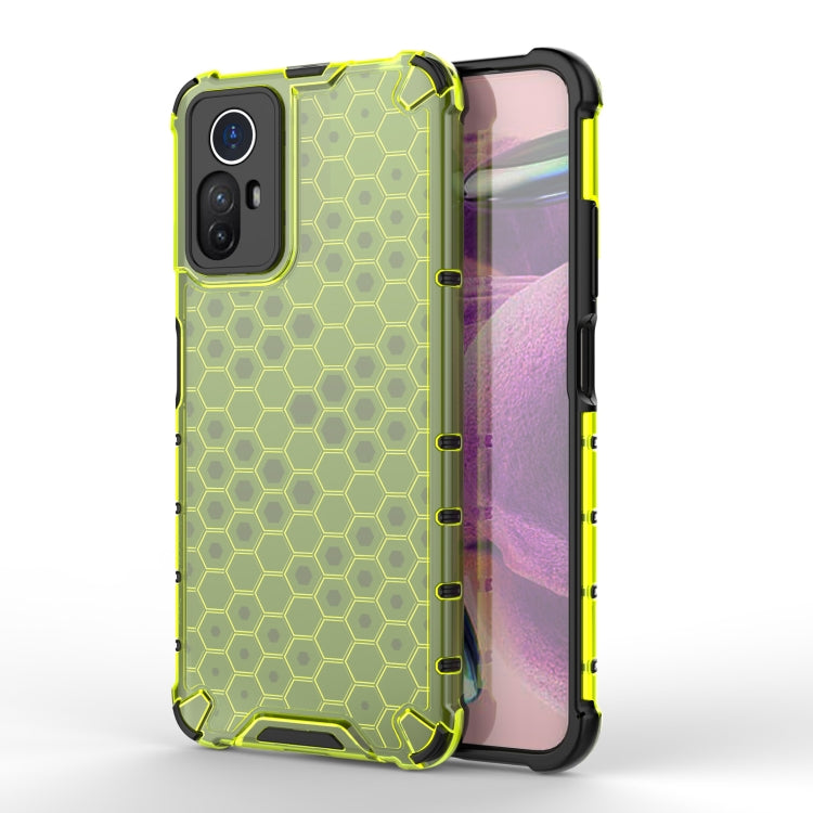 Green shockproof honeycomb phone case showing back, front, and side buttons.