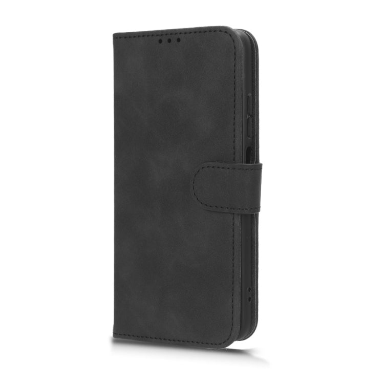 Black leather flip phone case with side flap and stitched card-slot detail
