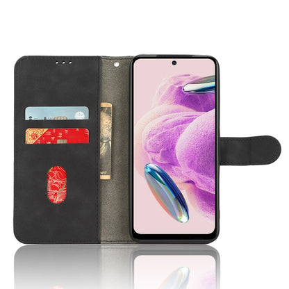 Black leather flip phone case opened with card slots and stand flap