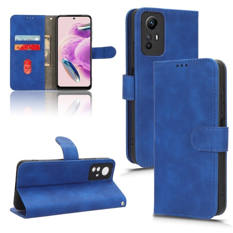 Blue leather flip phone case with magnetic closure and card-slot interior