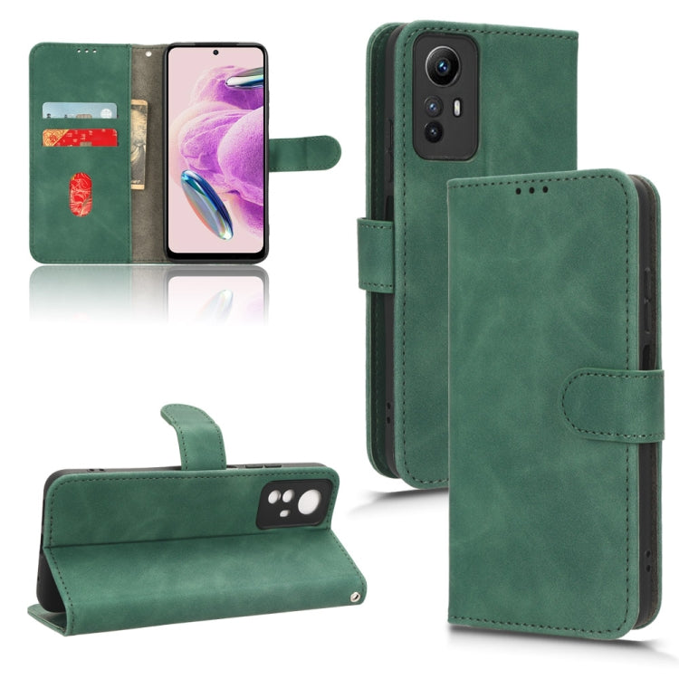 Green leather flip phone case with magnetic closure and front card-slot panel