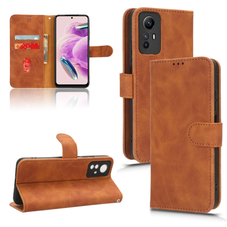 Brown leather flip phone case with magnetic closure and card-slot interior