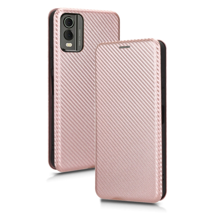 Pink carbon-fiber texture flip phone case, front cover visible with magnetic closure tab.