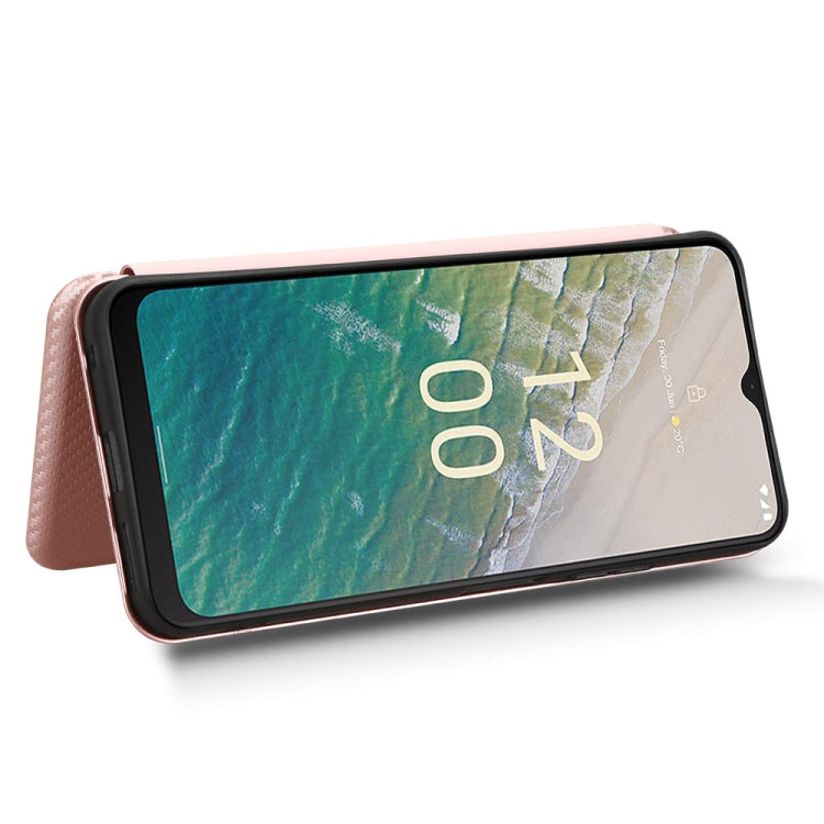 Brown flip phone case with carbon-fiber texture and magnetic closure; phone screen shown.