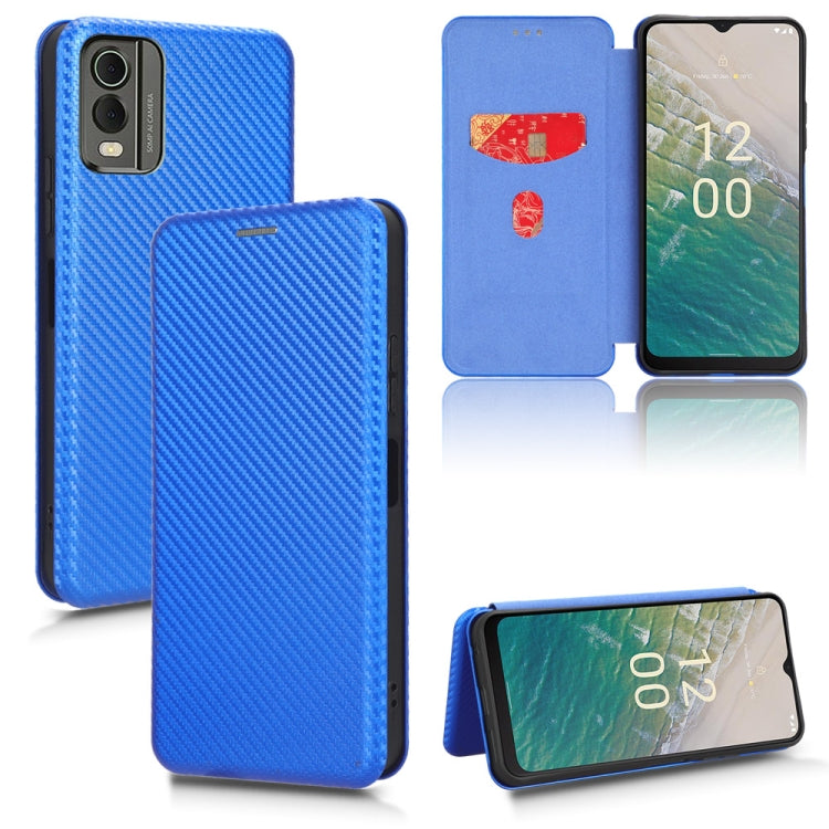 Blue carbon-fiber texture flip phone case with magnetic closure and front cover view.