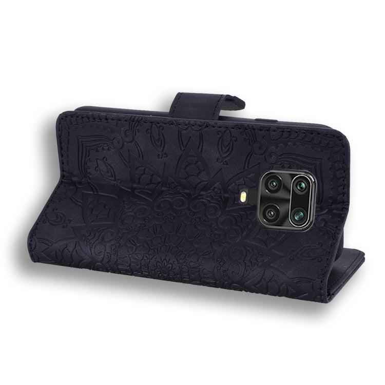 Dark navy PU leather folio case with embossed floral pattern, flip cover, and card slot tab