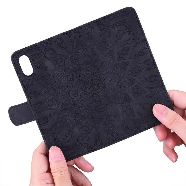 Dark navy PU leather back cover case with embossed floral pattern and hand grip strap