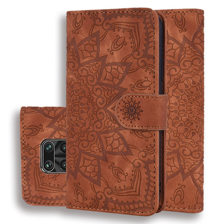 Brown PU leather flip phone case with embossed floral pattern and magnetic strap