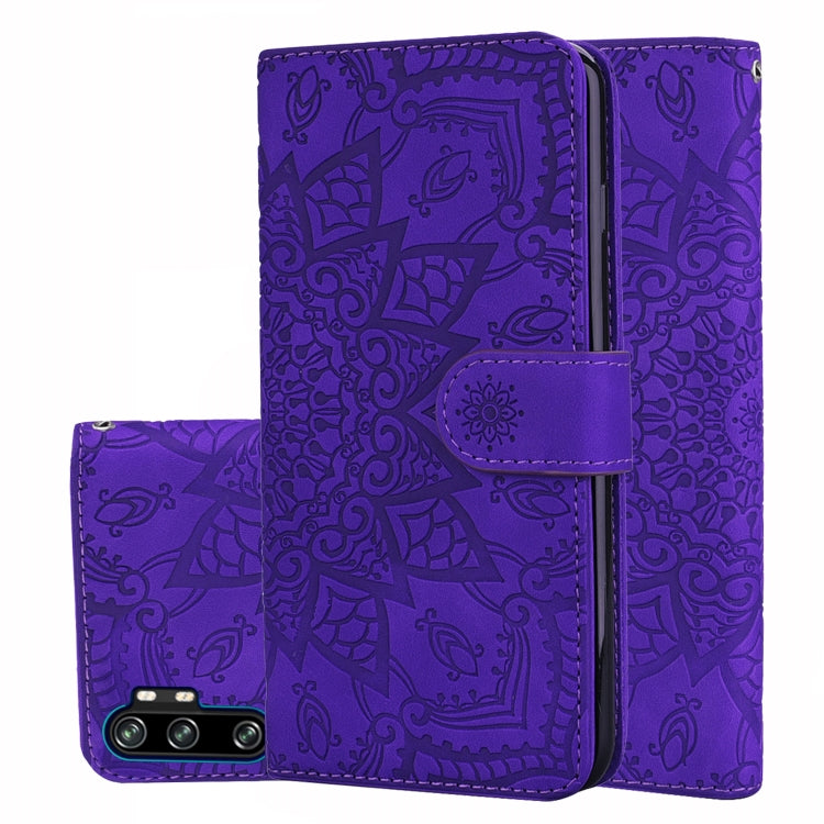 Purple embossed sunflower flip wallet case with front cover closed and center strap