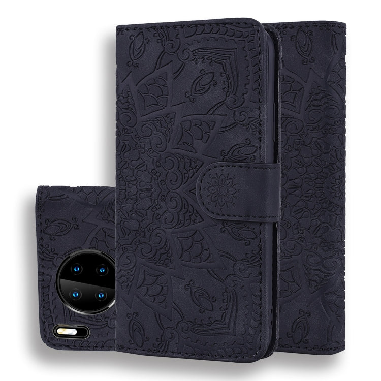 Dark embossed sunflower flip wallet case with front phone camera visible and center clasp