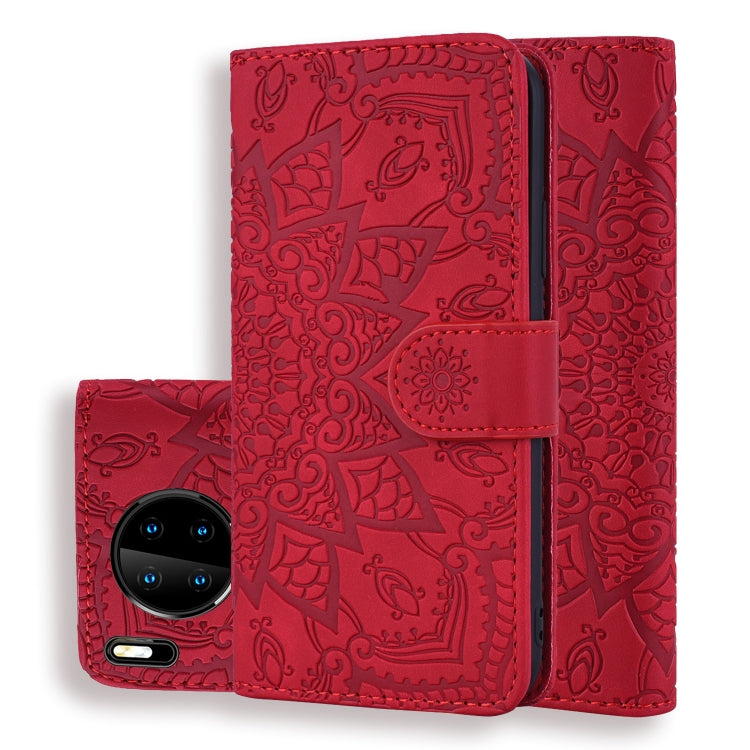 Red embossed sunflower flip wallet case with front phone camera visible and center clasp