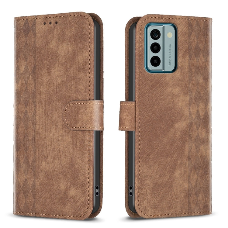 Tan plaid embossed leather phone case with flip cover and stitched side pocket.