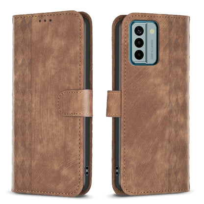 Tan plaid embossed leather phone case with flip cover and stitched side pocket.