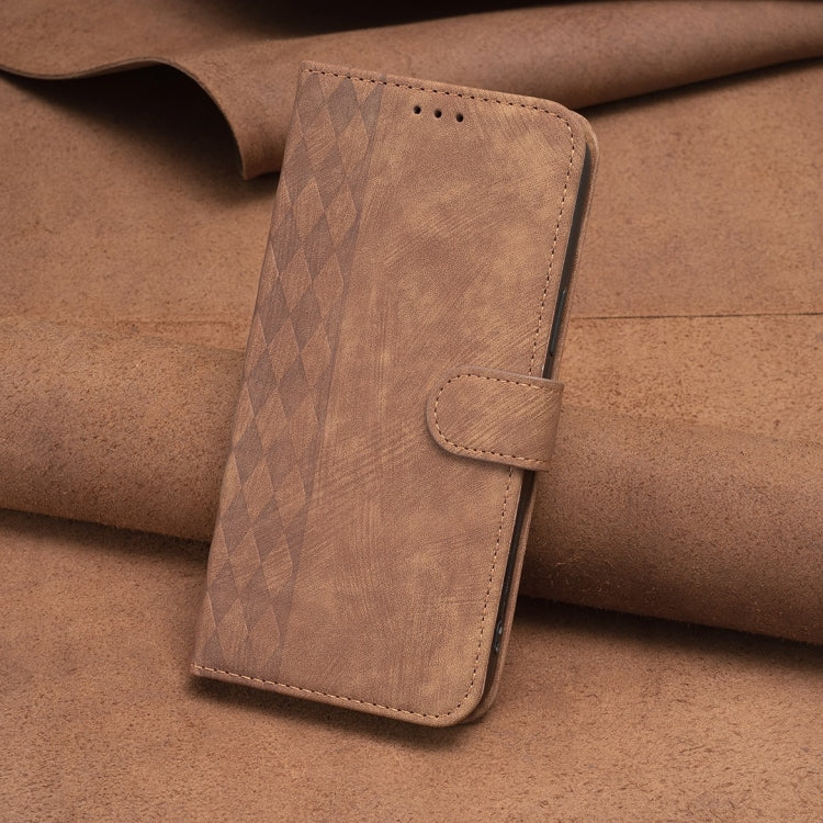 Brown plaid embossed leather folio phone case with front flap and stitched strap closure.