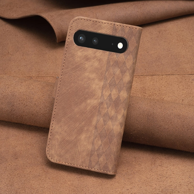 Brown plaid embossed leather phone case with front flap and camera cutout, angled view.