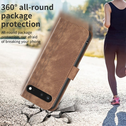 Brown plaid embossed leather phone case with front cover propped up as a kickstand.