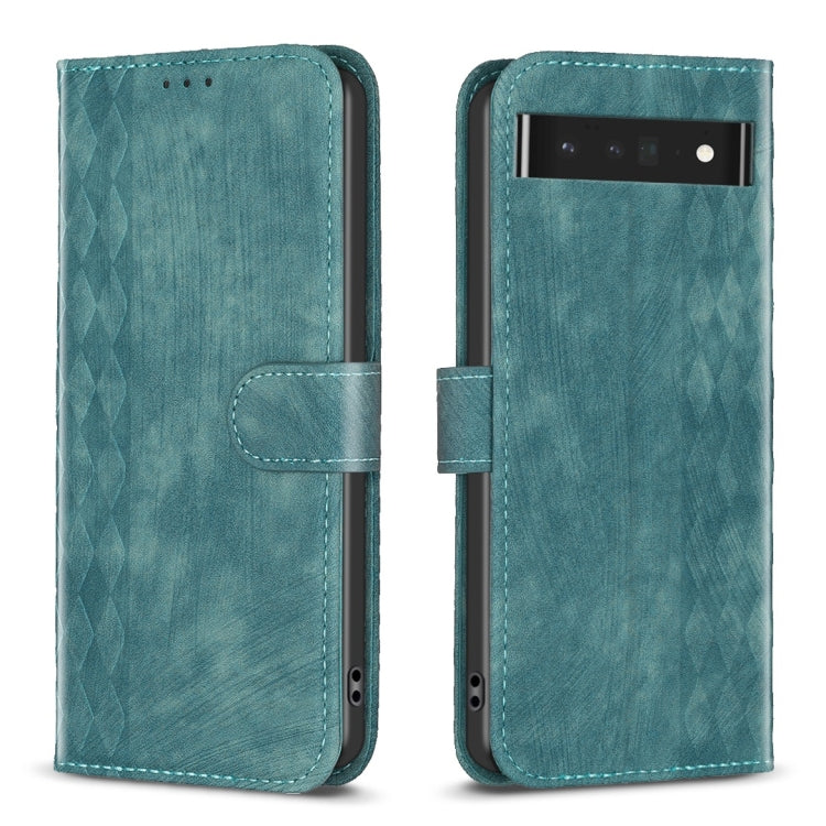Green embossed plaid leather phone case with folio strap and top opening for camera