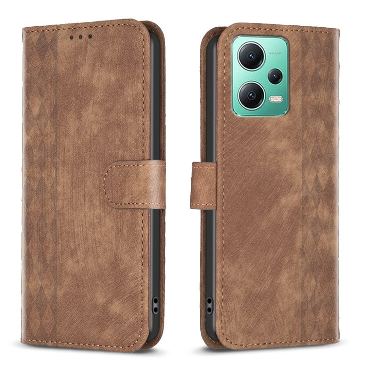 Brown plaid embossed leather phone folio case with magnetic strap and cutouts.