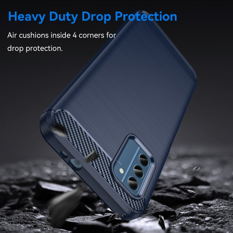 Blue rugged TPU phone case with textured grip and carbon-fiber style panel on the corner