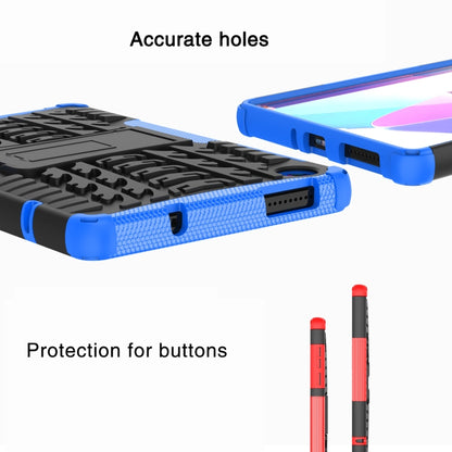 Blue rugged tablet case with raised tire-texture back and port openings