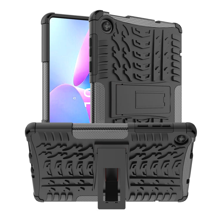Black rugged hybrid tablet case with tire-texture back and built-in kickstand