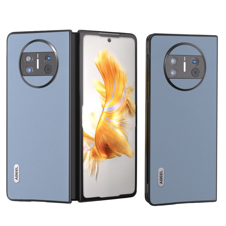 Genuine leather phone case with circular camera cutout, light blue textured finish