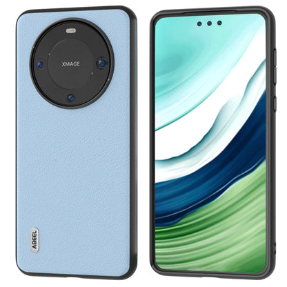 Genuine leather phone case with circular camera cutout, light blue textured finish