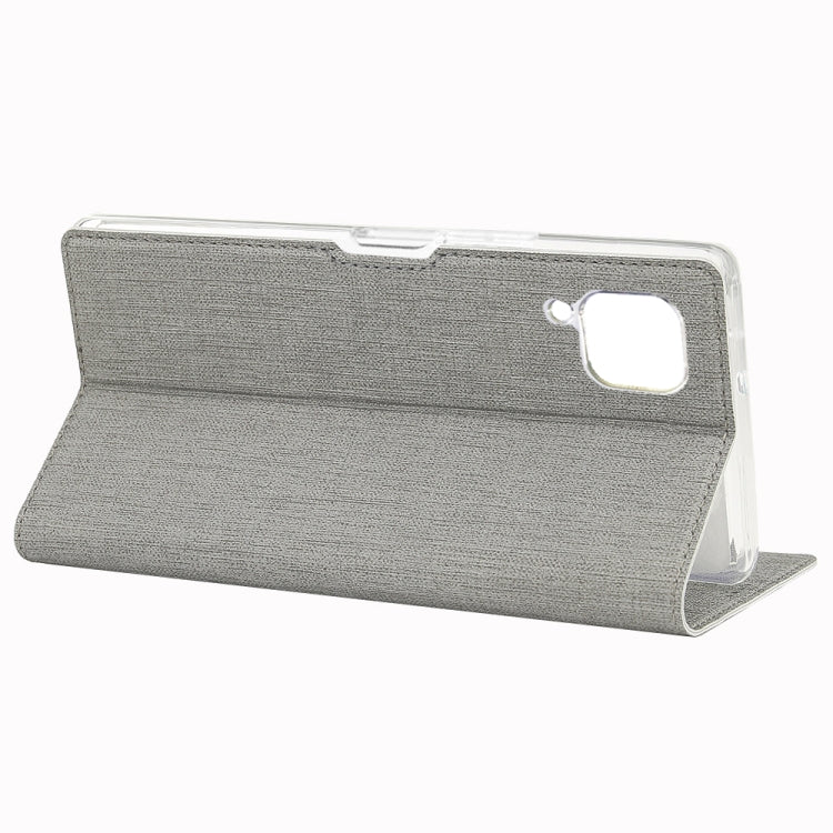 Grey magnetic flip phone case in open position with card holder panel